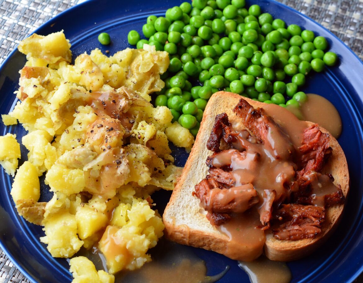 377 cal, 28 g protein. vegan open faced beef sandwich with buttered peas, potatoes, gravy