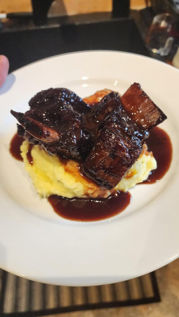 Red wine braised short ribs from local beef finished with a port reduction