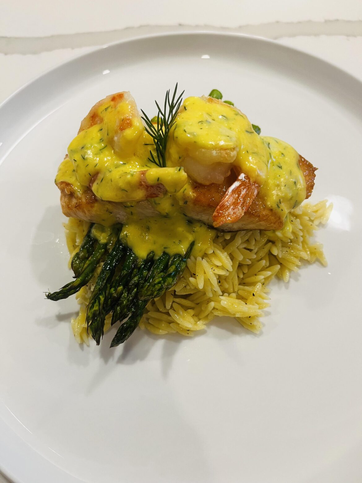 Salmon Oscar, butter poached shrimp, garlic parm orzo