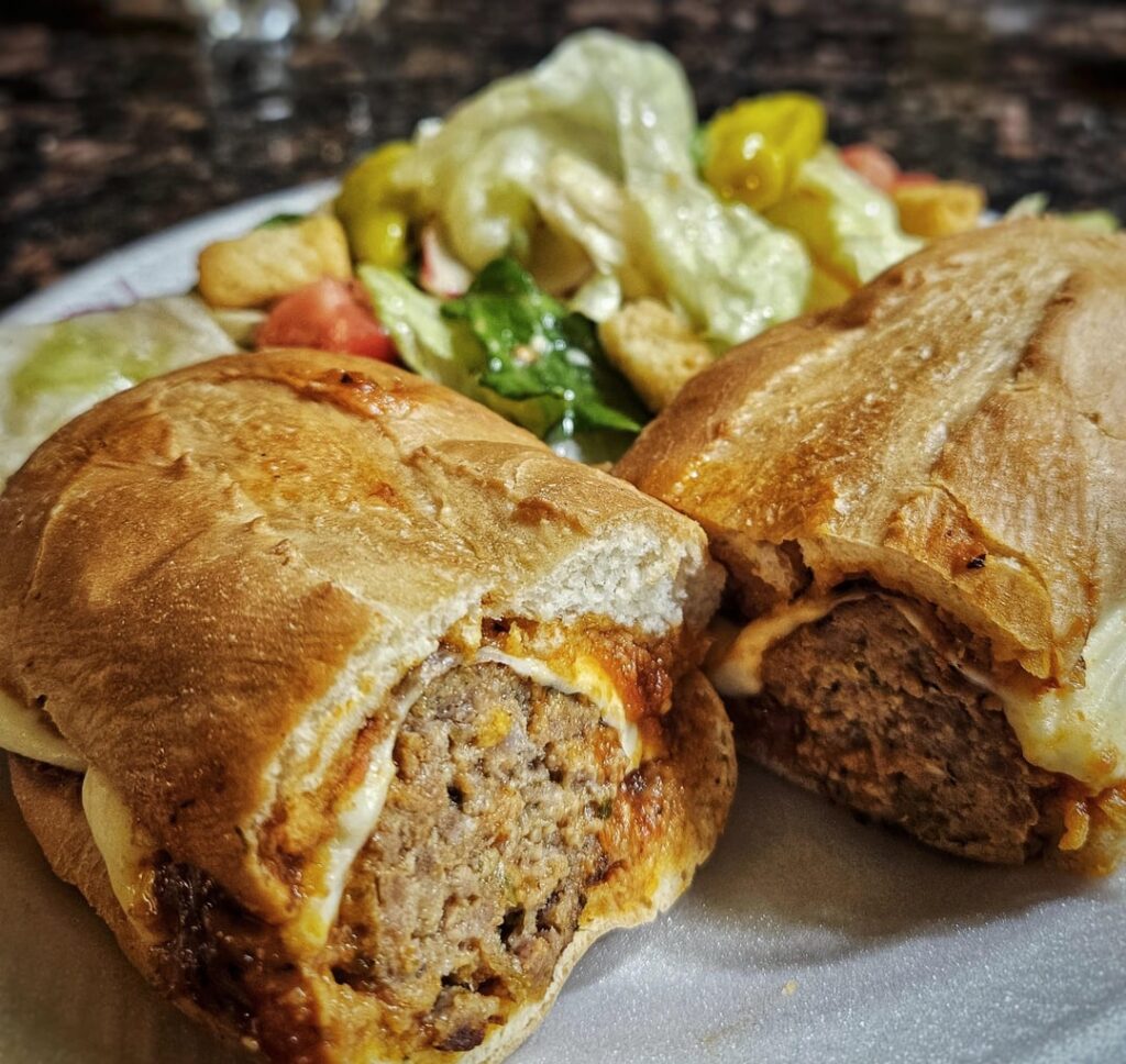 Meatball sub and side salad. Homemade.