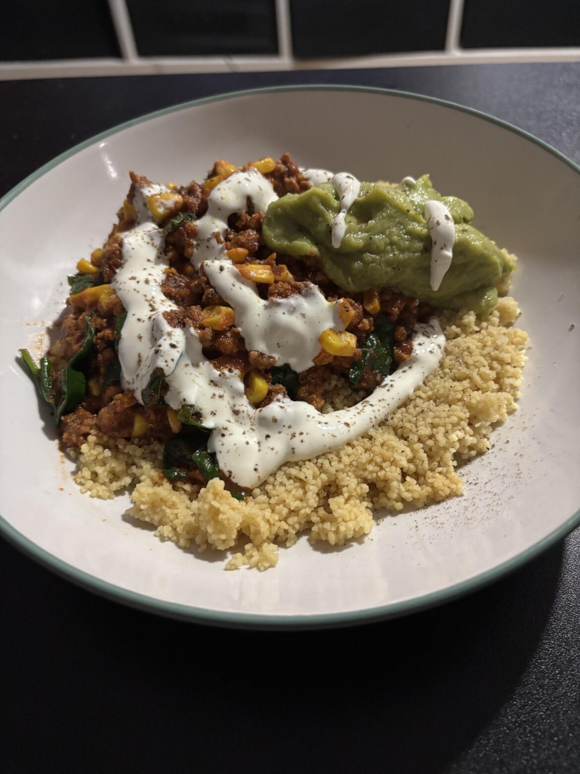 Couscous with chipotle pork, avocado and sour cream