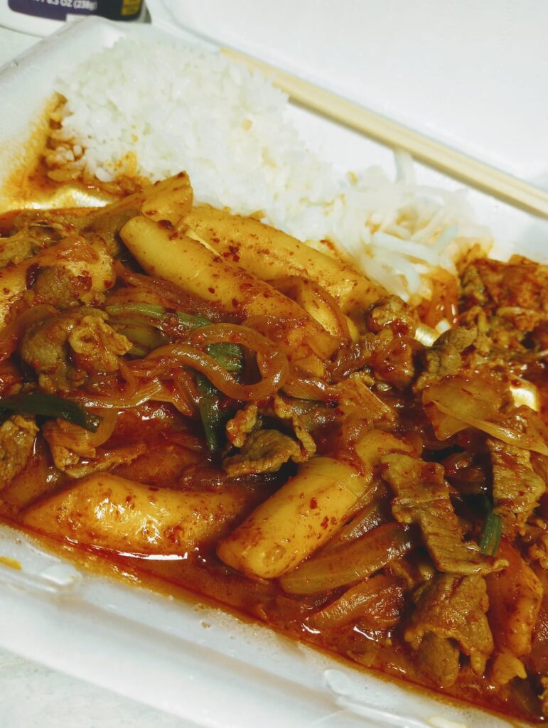 My favorite comfort food...tteokbokki, rice, cabbage and white radish kimchis. From Korea House, a local Korean restaurant. Soo good!