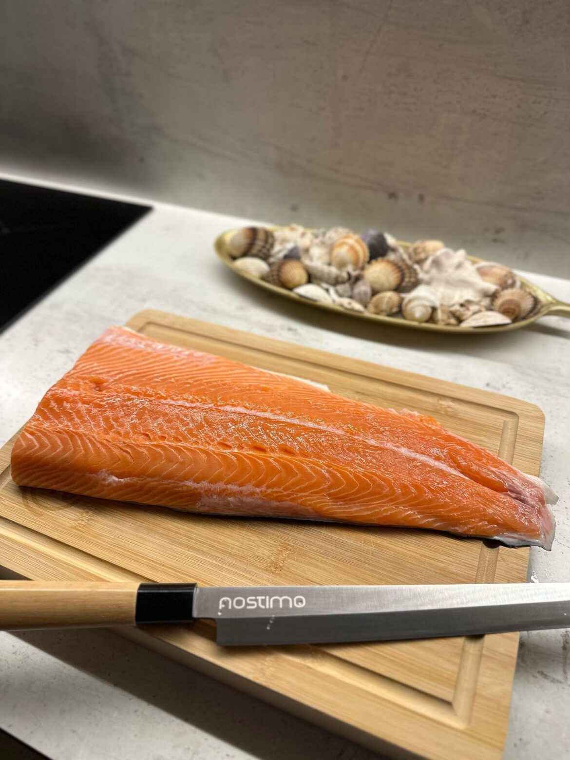 First time buying “regular” salmon for sushi—prepping it like a mad scientist before freezing!