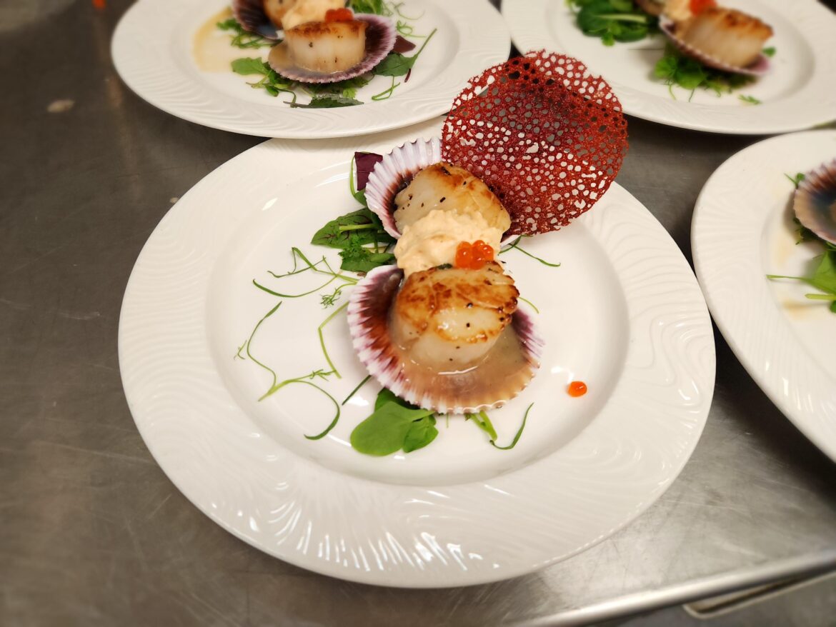 Diver scallop, basil pan sauce, rhubarb foam, beet tuile, trout roe