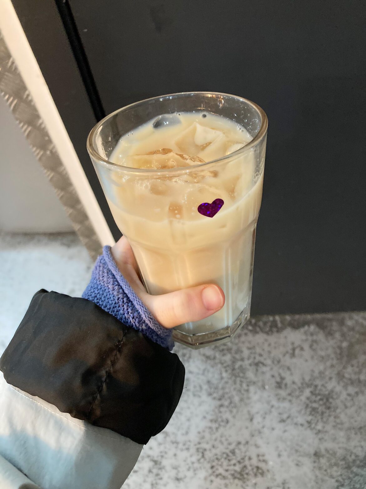 Starbies barista attached a heart sticker to my free cup of ice; pictured here on my homemade milk tea