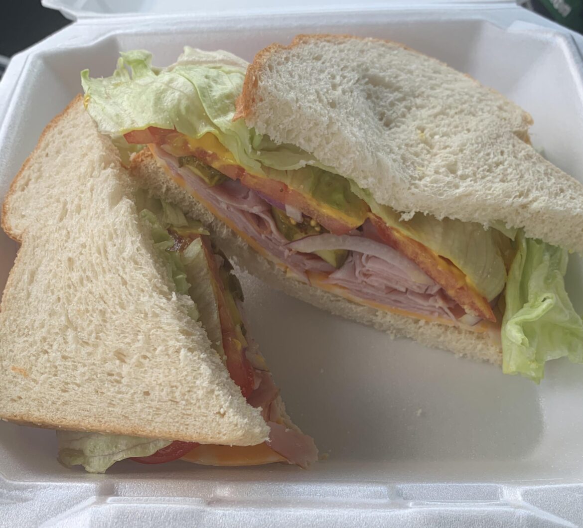 Ham & Provolone with home grown tomatoes, homemade pickles on homemade whole wheat bread.