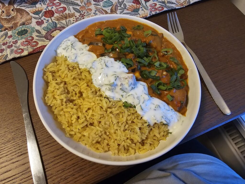 Aubergine curry with yellow rice