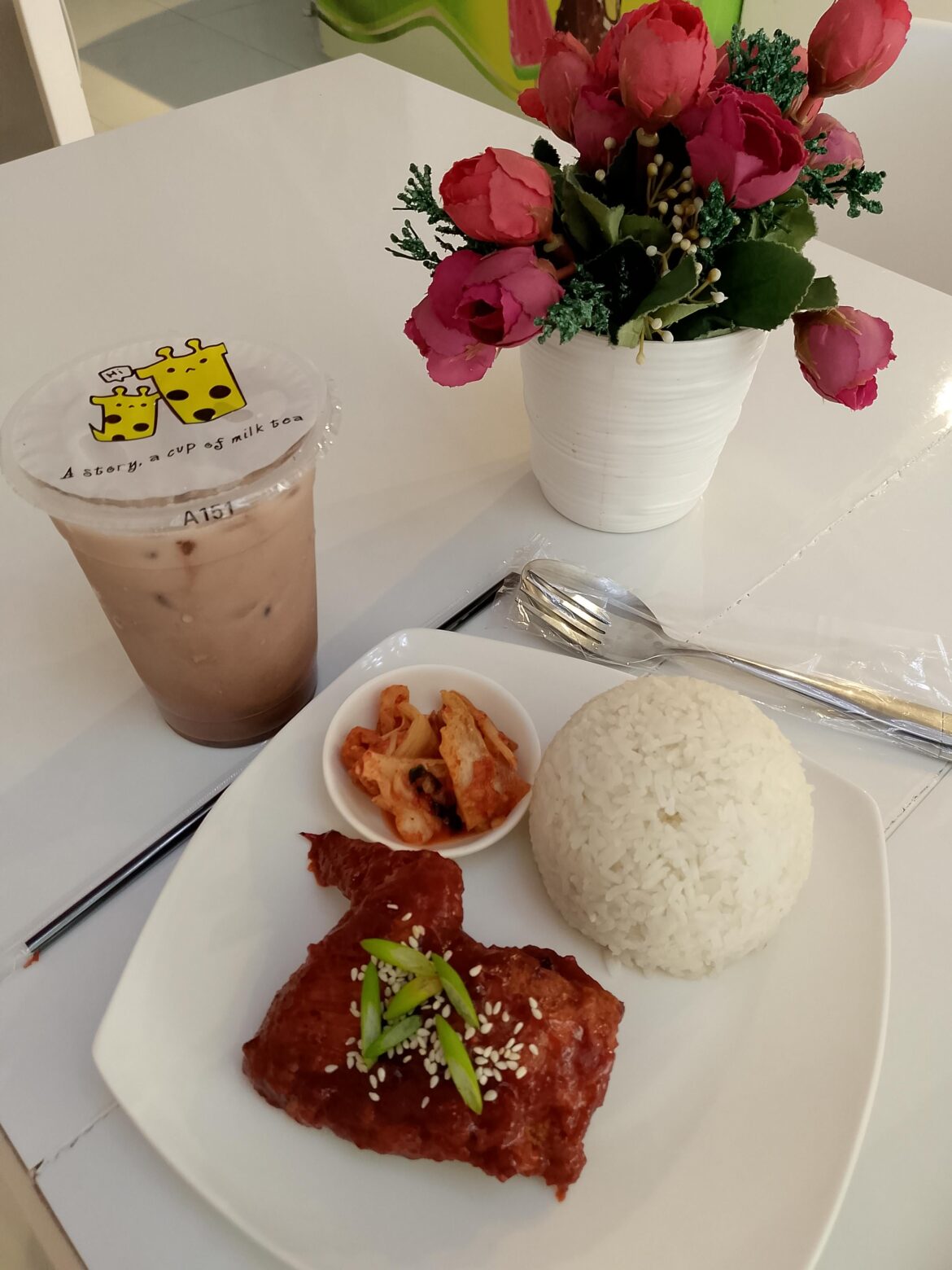 I ate yangnyeom chicken together with a little bit of kimchi and drink a chocolate milktea :)