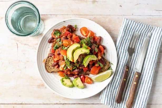 A picture of smoky Mexican beans on toast made with kidney beans, tomatoes, peppers and paprika