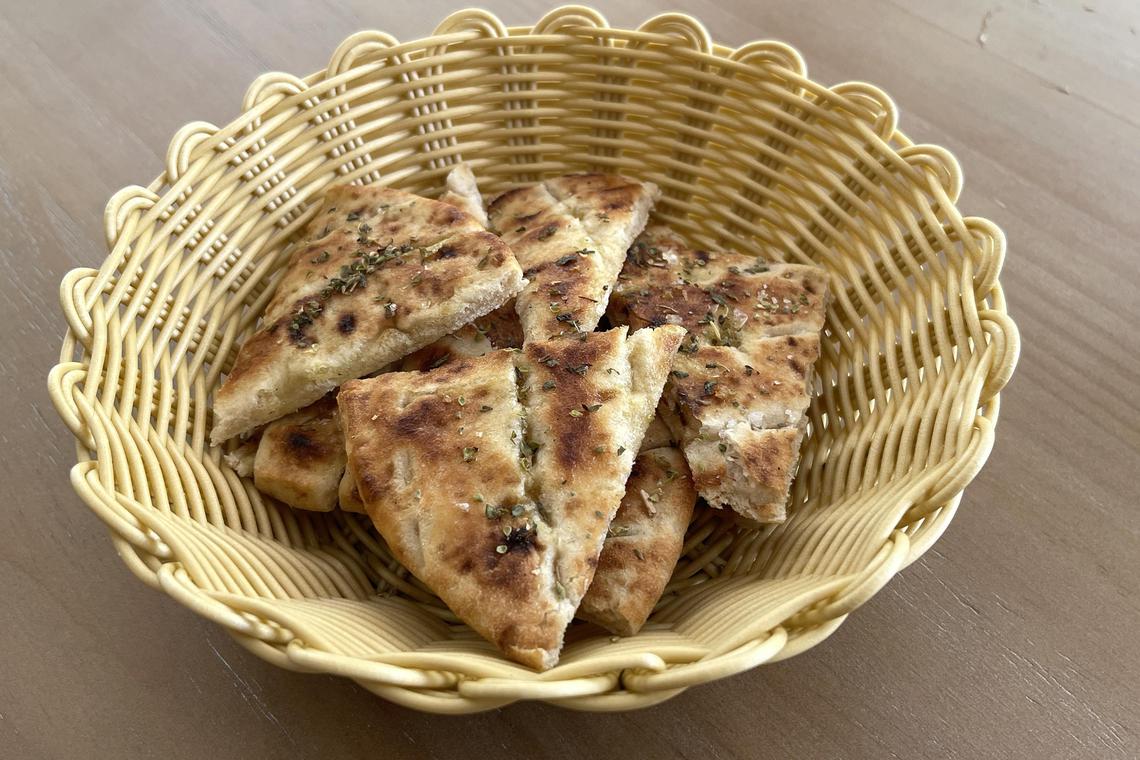 hkpicks09 - Pita bread is handmade in-house at Hapipha Mediterranean Taverna.

Byline: Hedy Khoo