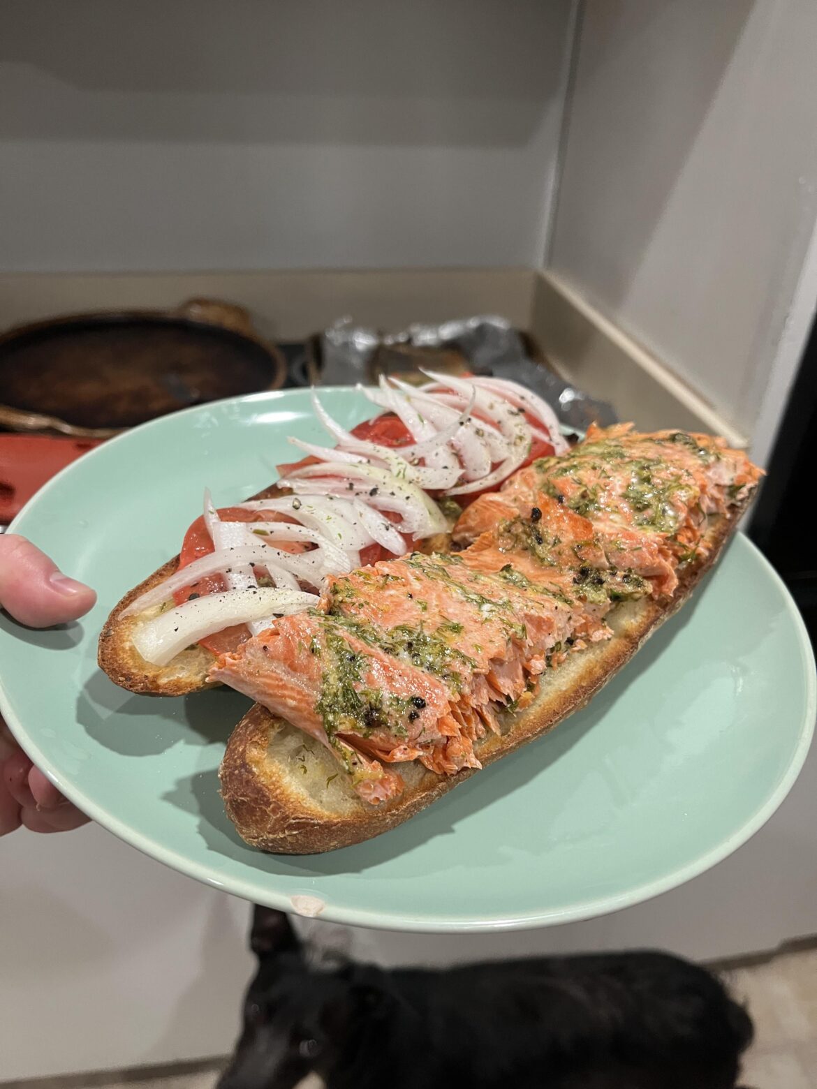 Roasted salmon with lemon and dill on toasted baguette