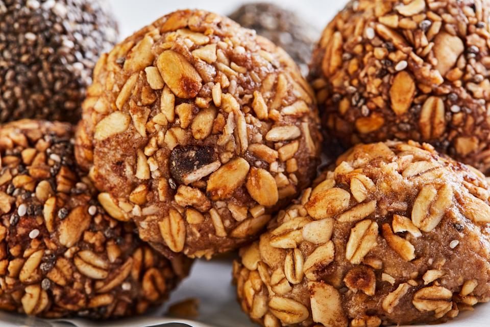 Healthy Organic Energy balls Muesli Bites with Nuts, Cocoa, Chia and Honey - Vegan Vegetarian Raw Snacks or Food. copy space. Close-up.