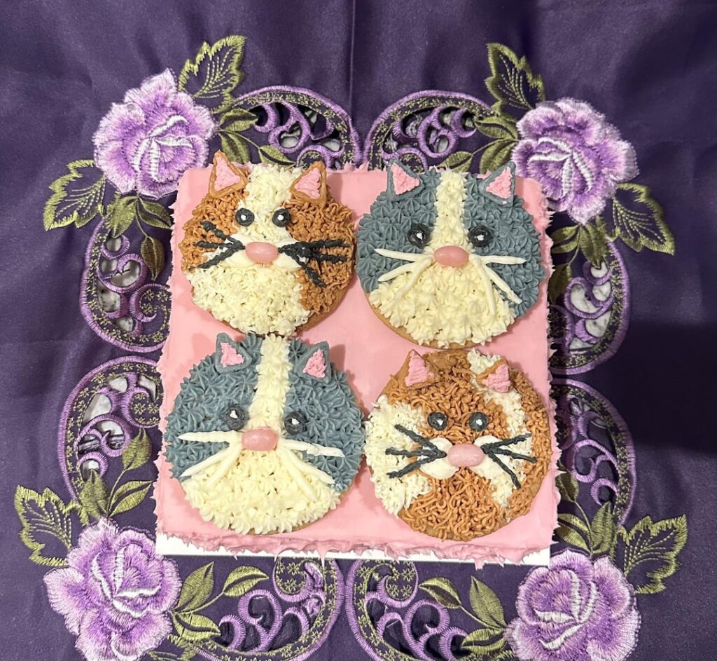 I’m part of a group that makes birthday cakes for kids in foster care.  The kids range in age from 1-19; they (or their guardians) chose the theme and flavor.  This 10 year old girl chose cats and cookies and cream.  The cats are sugar cookies. 🐈