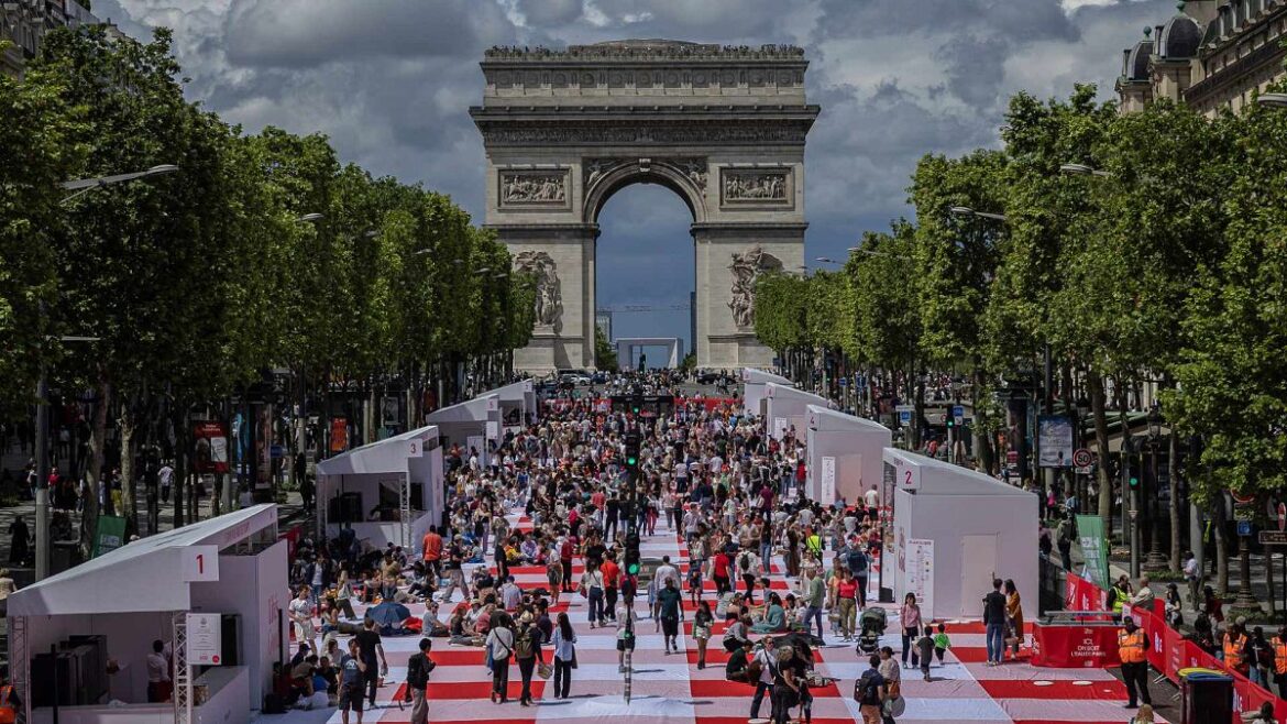 Paris' famous Champs-Élysées transformed into a massive free picnic with treats from famous chefs