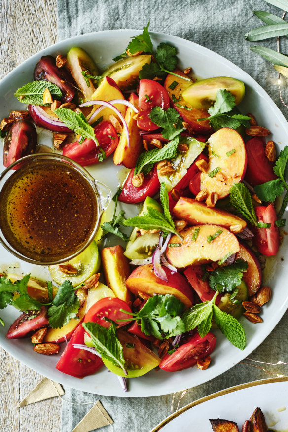 Tomato salad with peaches, mint and almonds is a favourite in summer for Busuttil Nishimura.