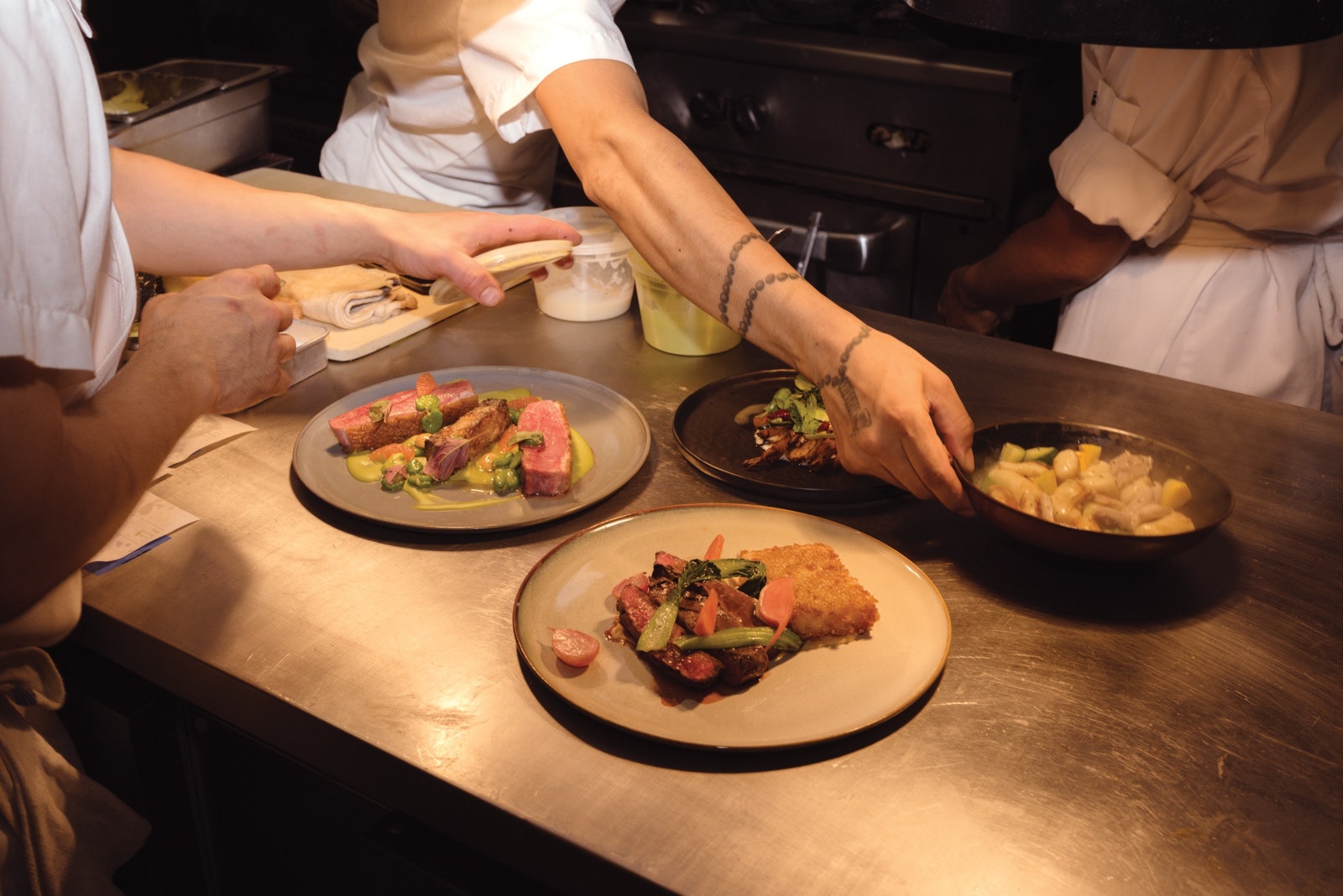 Image may contain Food Meal Human Person Furniture Dining Table Table Cafeteria and Restaurant