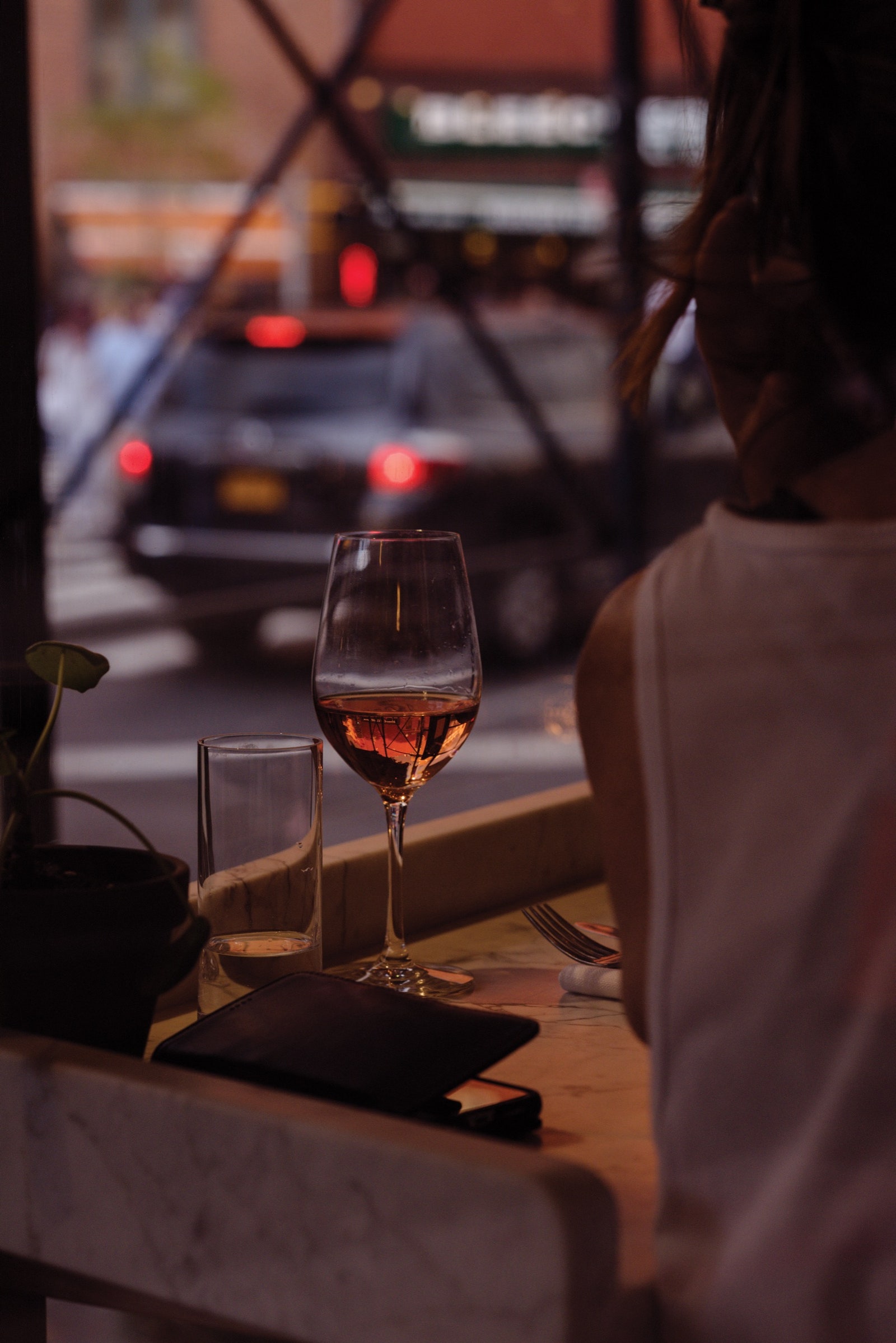 Image may contain Glass Vehicle Transportation Automobile Car Human Person and Goblet