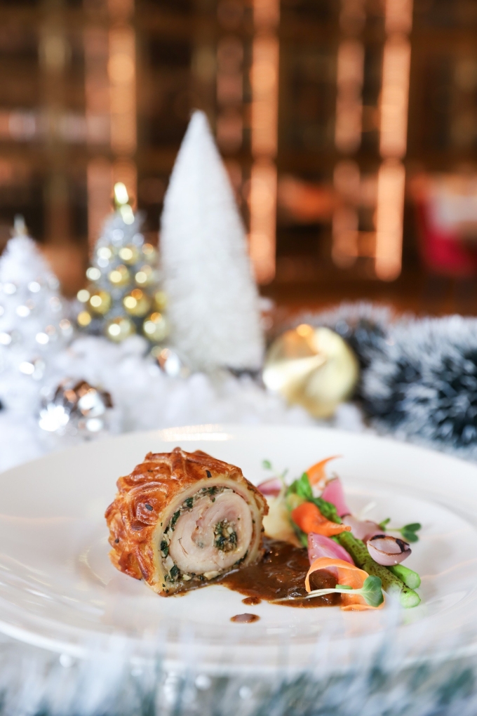 The Christmas-themed menu features a variety of seasonal dishes, such as wellington. Photo courtesy of Lotte Hotel Saigon
