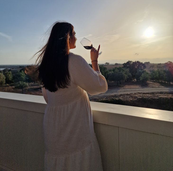 Anna enjoys a glass of wine at the end of the day