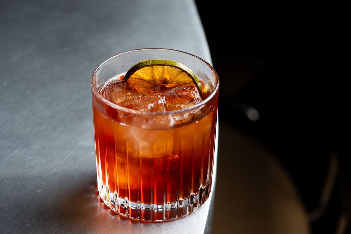 A Negroni set on a white counter at Bar Etoile.