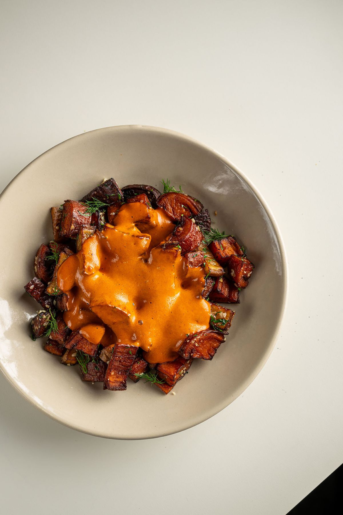 Root vegetables, guajillo sabayon, fried dill at Bar Etoile.