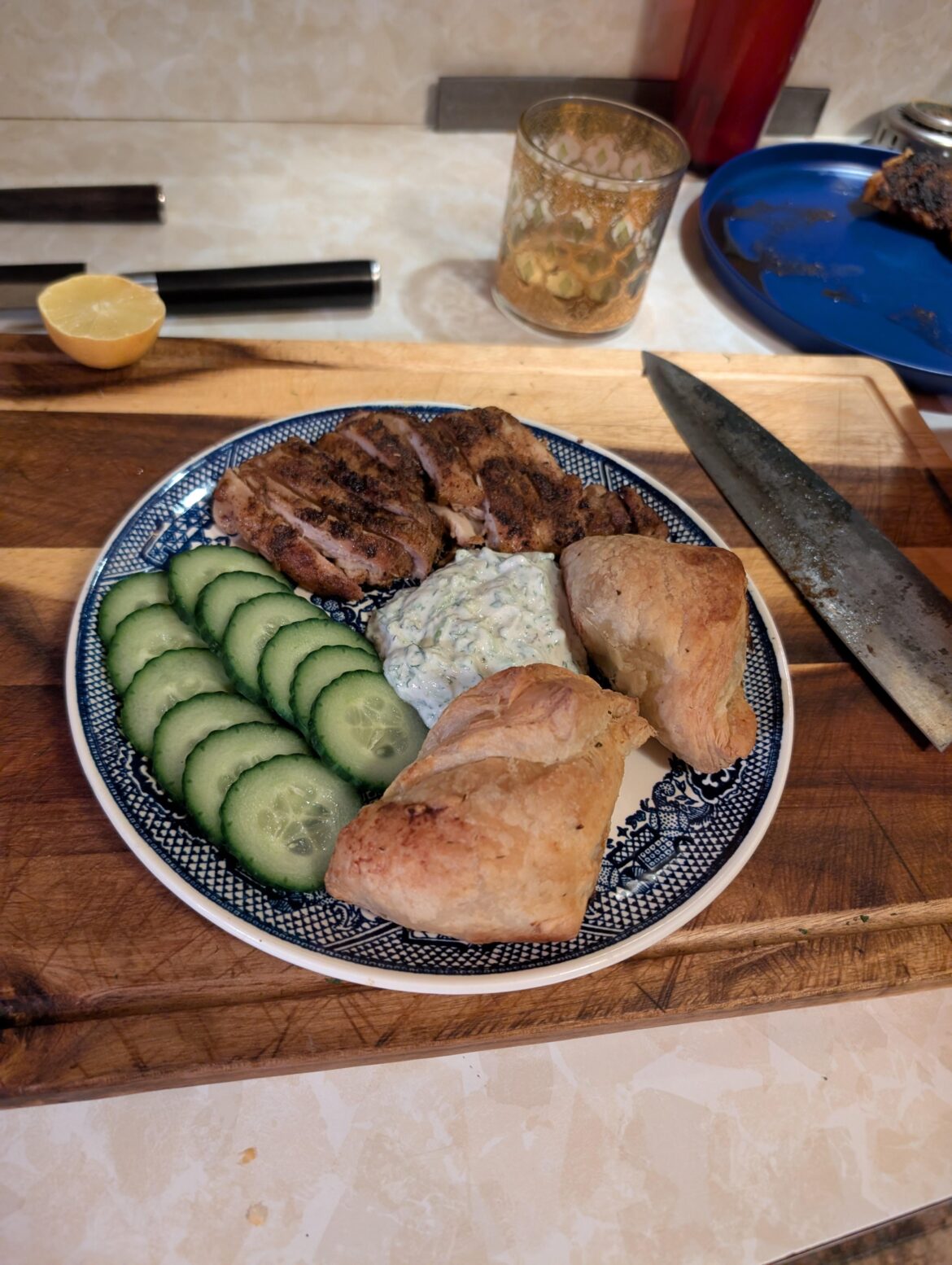 Spanikopita (puff pastry instead of phyllo), pan seared chicken thighs, homemade tzatziki