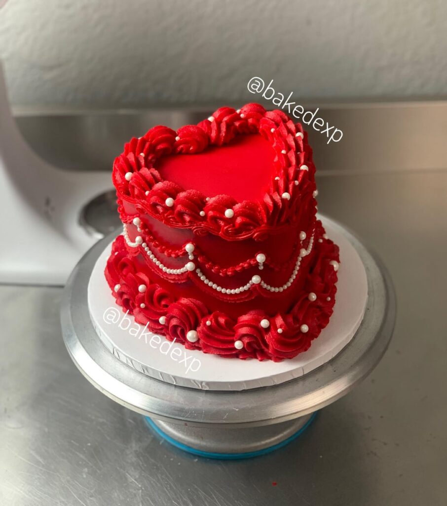 The birthday girl requested a red heart cake with “lots of gorgeous pearls on the side”
