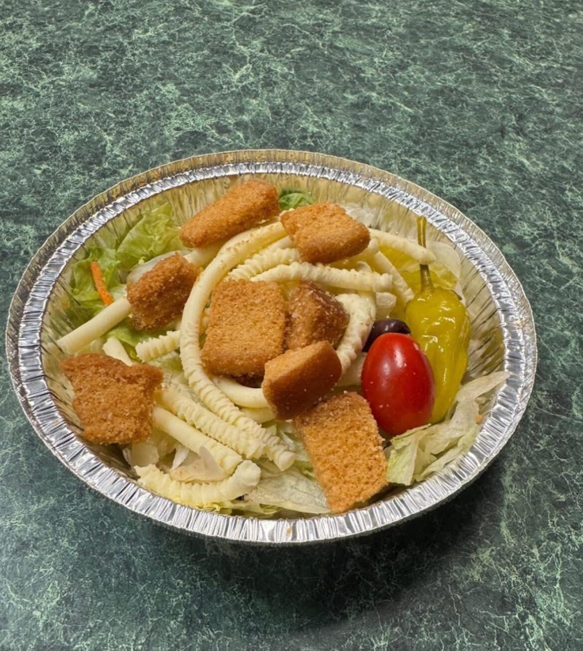 The salad at the local pizza place