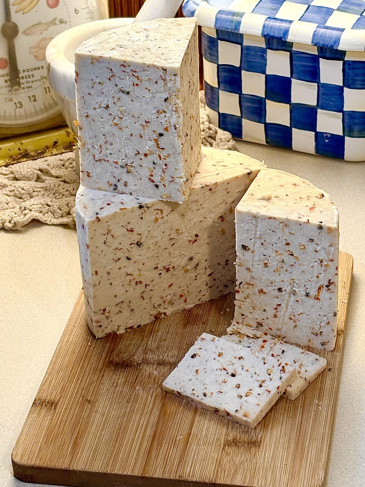 Homemade red and black pepper jack cheese. Definitely has a kick!