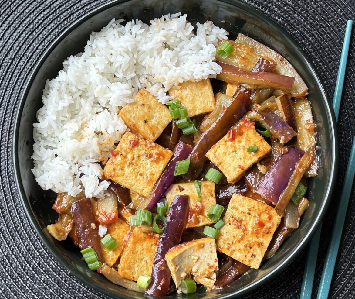 Szechuan pepper eggplant and tofu stir fry with rice. 369 cal, 26 g protein for  everything.