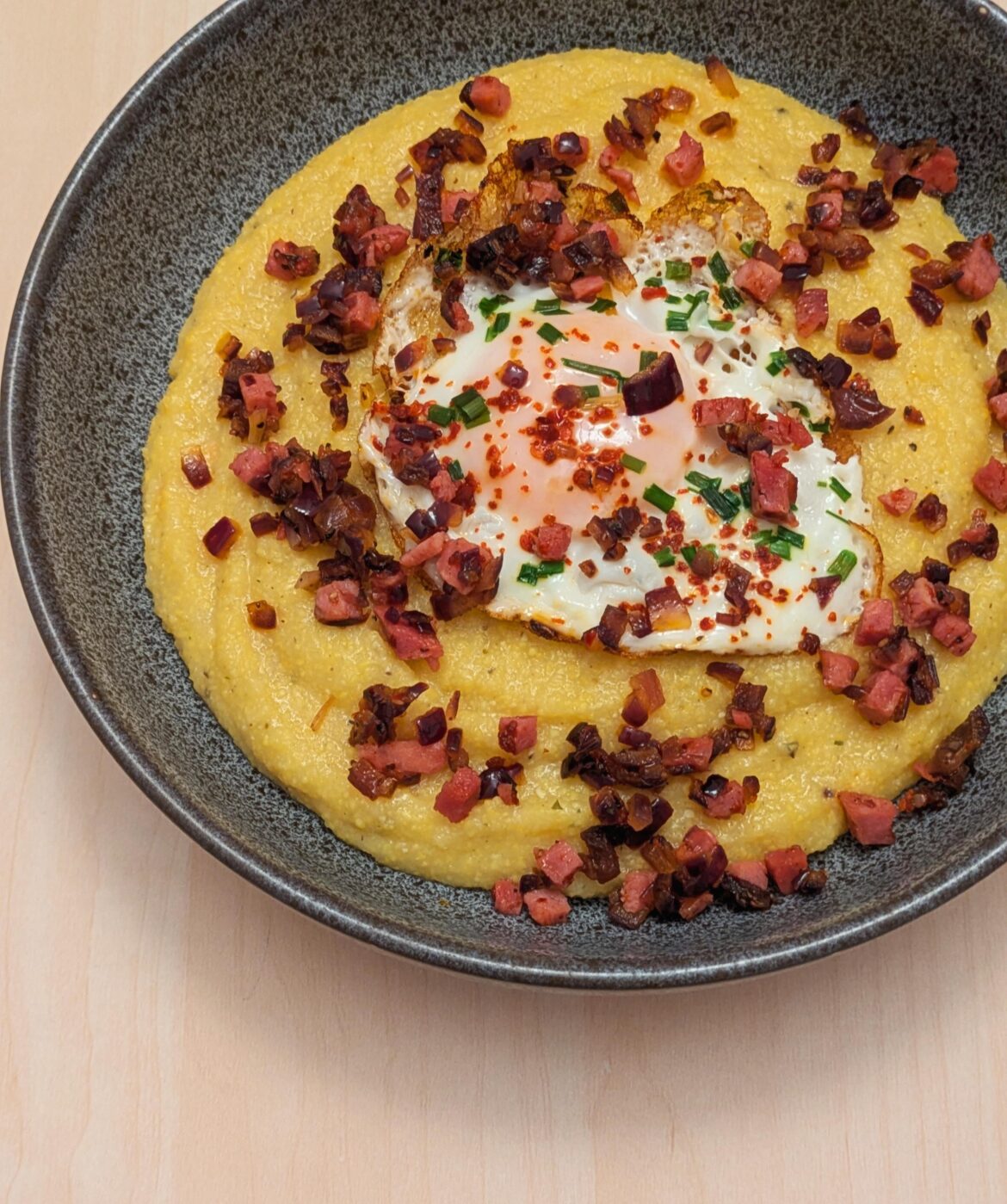 Polenta with egg and Schinkenwürfel