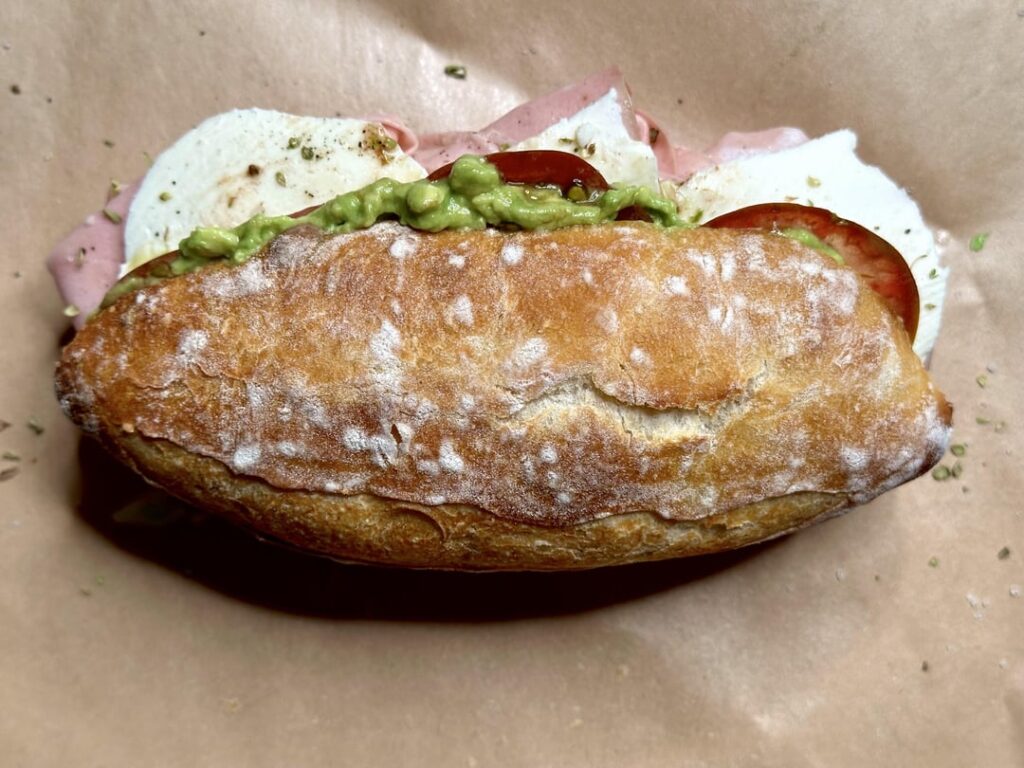 Mortadella, mozzarella, and avocado on homemade sandwich roll