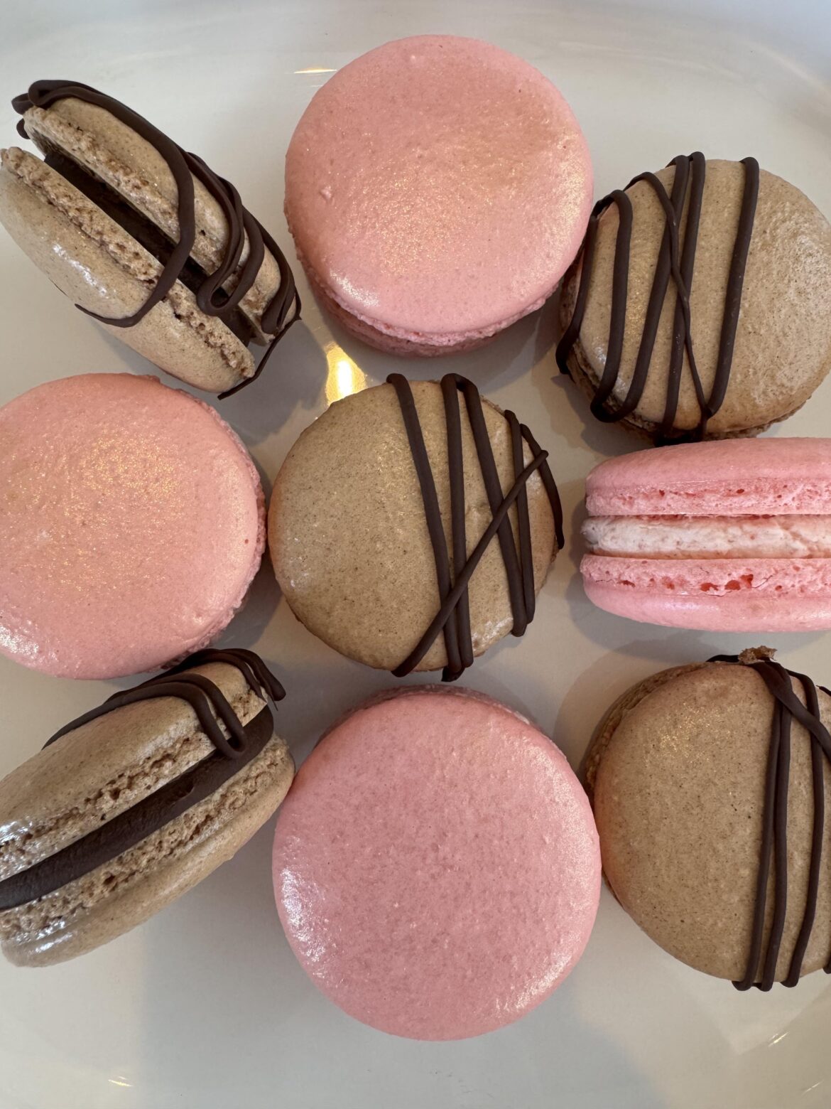 A moment for these strawberry and chocolate macarons!