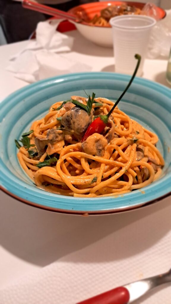 Spaghetti with mushrooms, white wine, chillies, korean gochujang, tomato sauce and cream