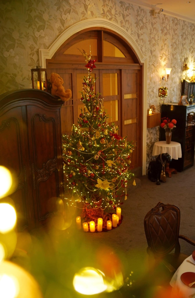 The restaurants Christmas tree sparkles with lights and ornaments. Photo courtesy of La Villa French