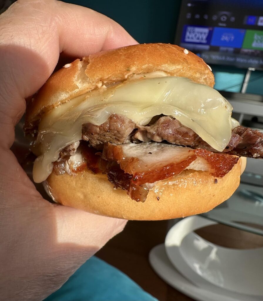 Brisket with chicharrón,Swiss and chipotle garlic mayo.