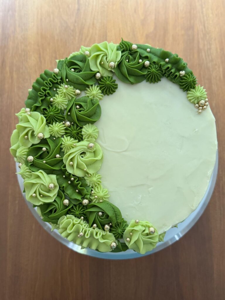Pistachio cake with white chocolate buttercream and pistachio ganache filling