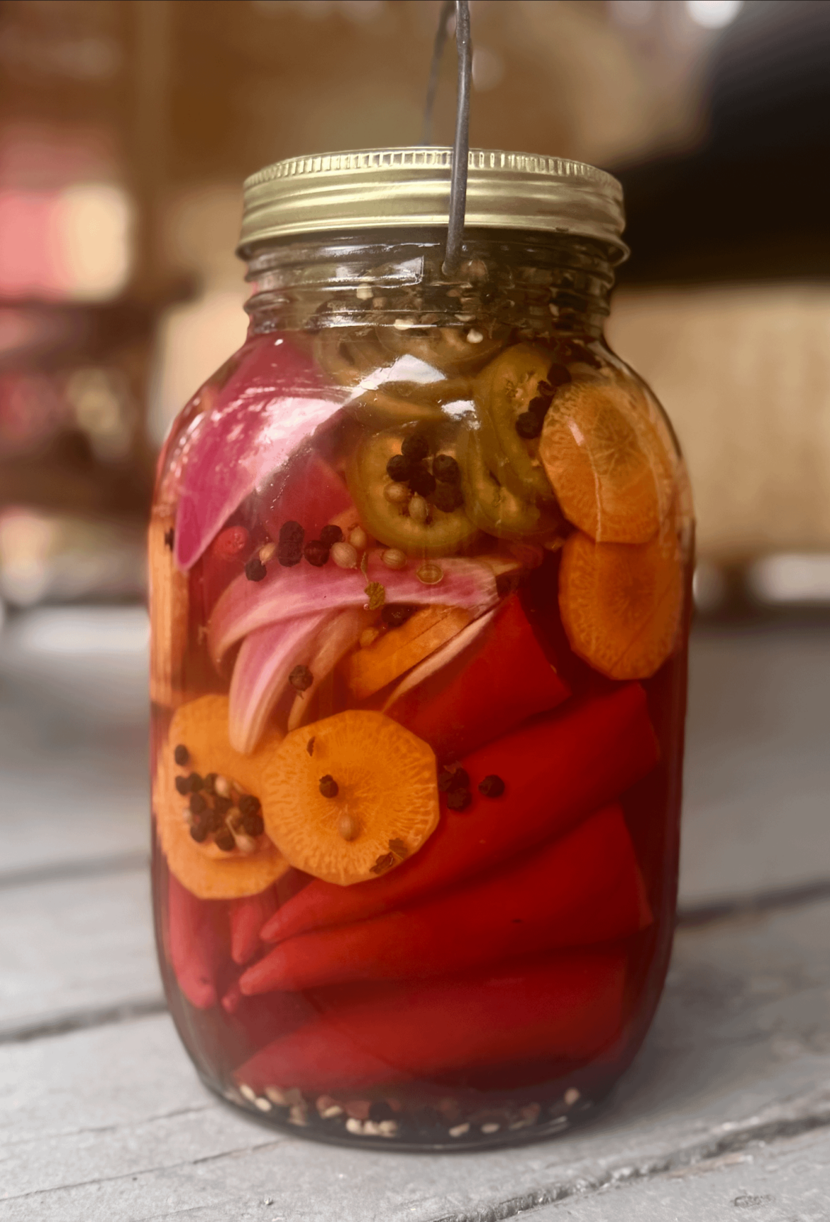 [OC] Pickled Red and Green Jalapeños, carrots, red onions.