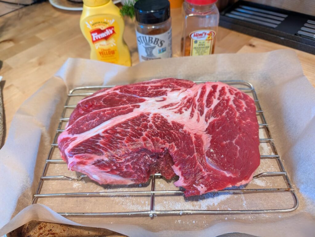 Smoked 3lb chuck at ~225 for 7hrs.  Wrapped in aluminum foil at 170.  Used a cheap Walmart grill and the snake method.  2nd time I smoked beef and I was happy with it.