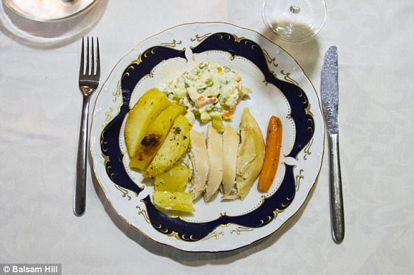 For the main course we eat roast chicken, served with baked potatoes, onions and carrots