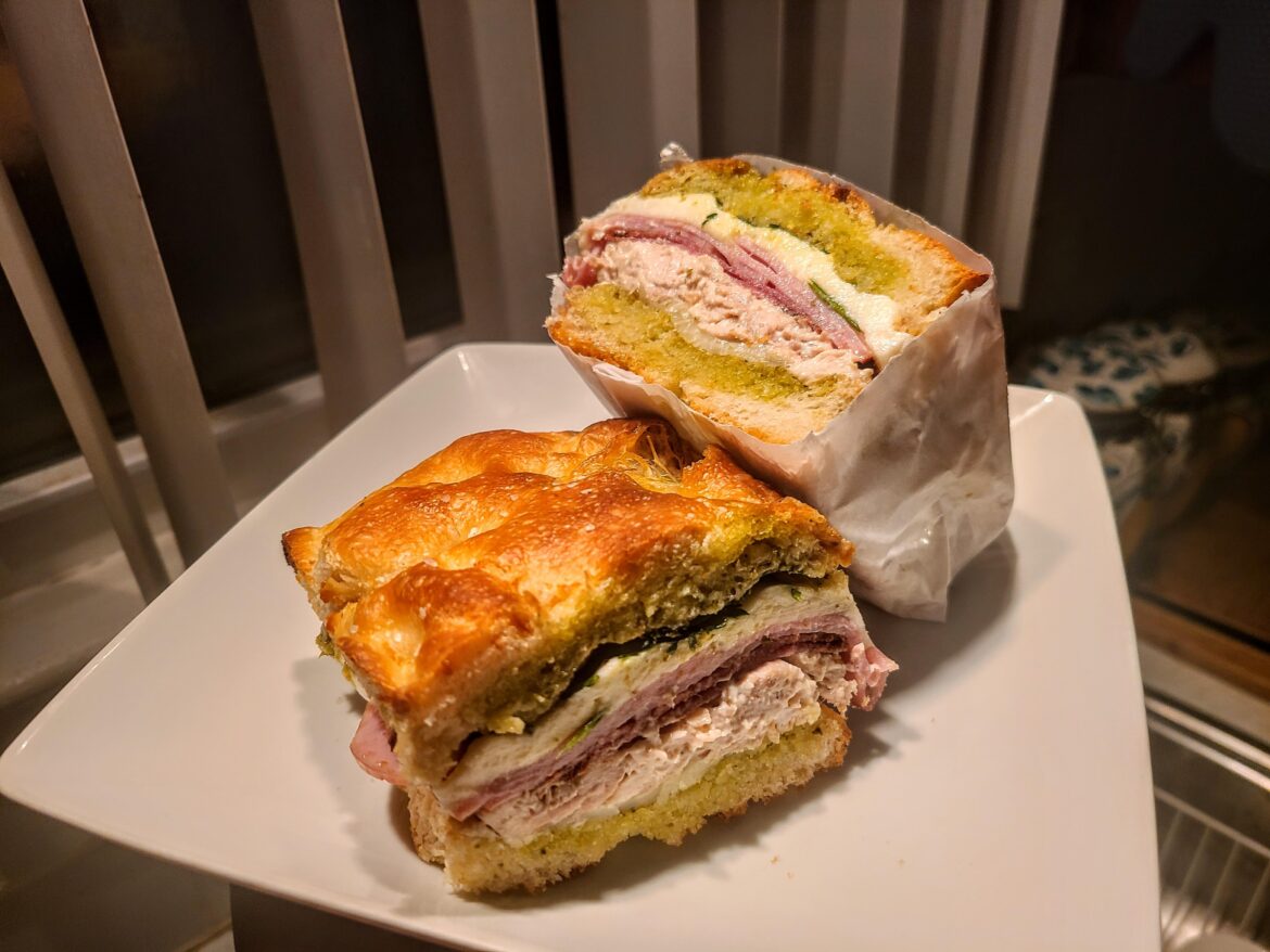 [Homemade] Smoked Ham, Baked Salami, Smoked Provolone, Fresh Mozzarella and Roast Chicken on Foccacia with Pesto and Parsley Greens