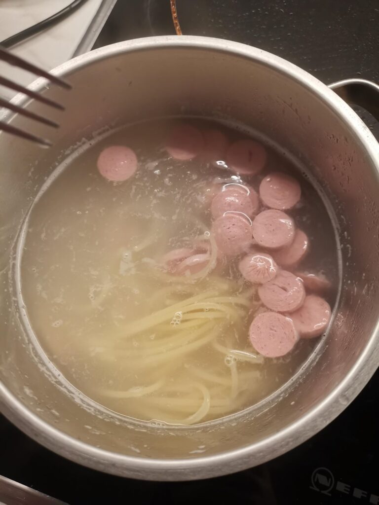 Hotdog water and noodle soup