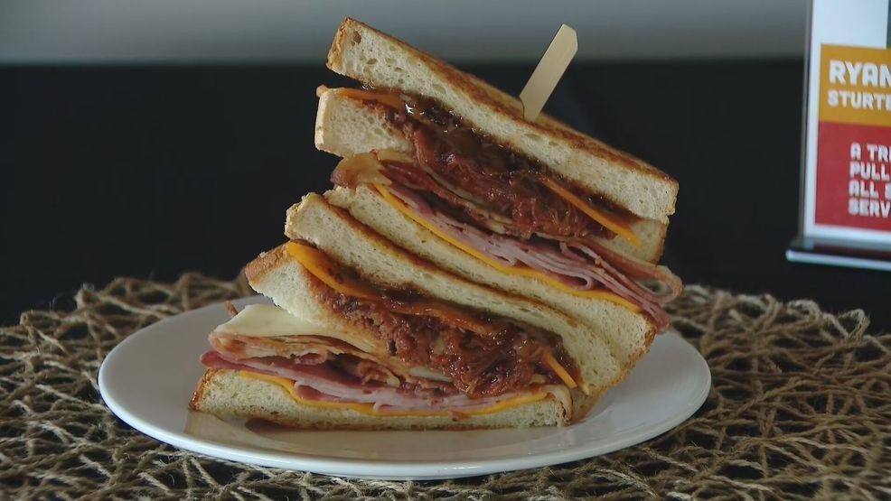 3 Little Pigs grilled cheese brings home the bacon in Timber Rattlers’ food fight header logo
