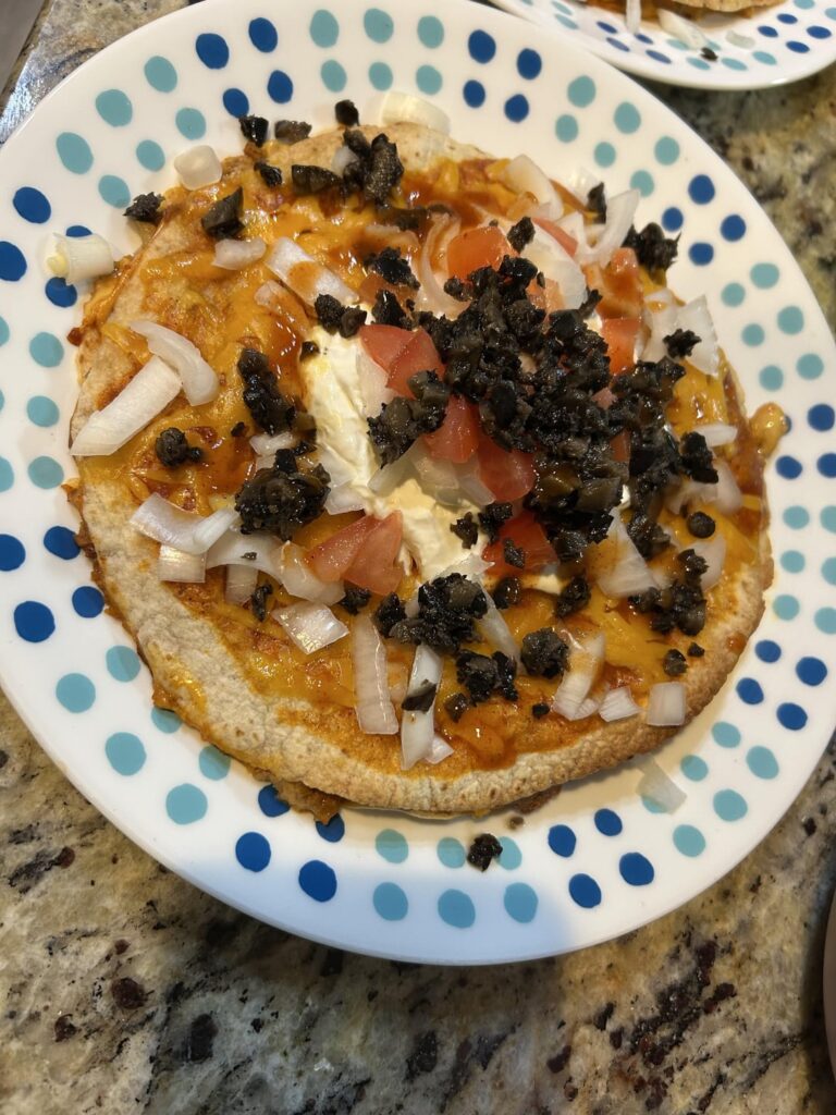 Taco Bell copycat Mexican pizza… but better! We accidentally got chopped olives instead of sliced though so it looks a little off imo. Tasted amazing!!