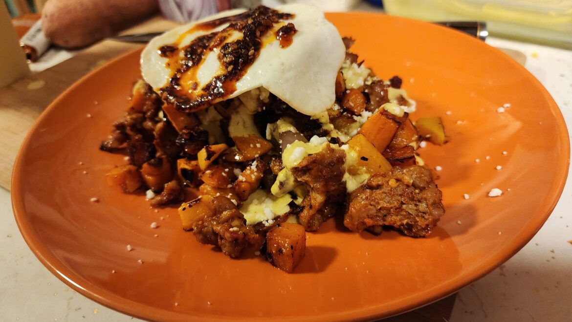 I'm usually drunk when I cook. Here is some over medium egg with chorizo, butternut squash, sweet potato, red onions, poblano mayo, queso fresco and chili crisp!