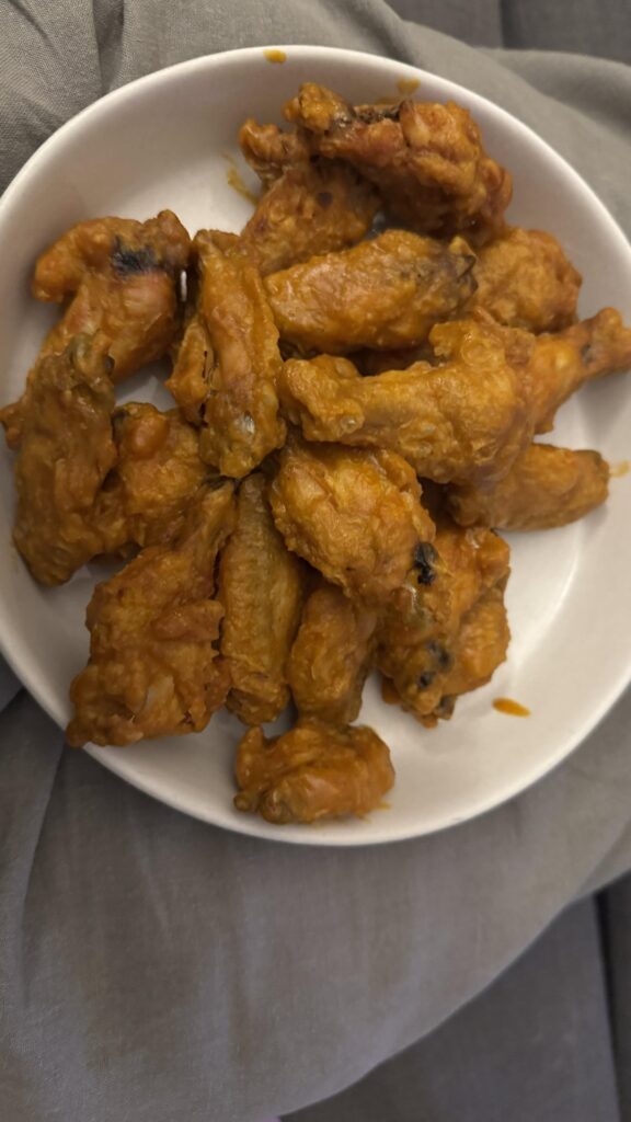 Kenji’s Wings. Only I cheated and let them dry for 90 minutes instead of overnight but they were still C R I S P Y 💯  Next time I’ll do overnight, promise! Sauced Orange Buffalo’s original sauce.