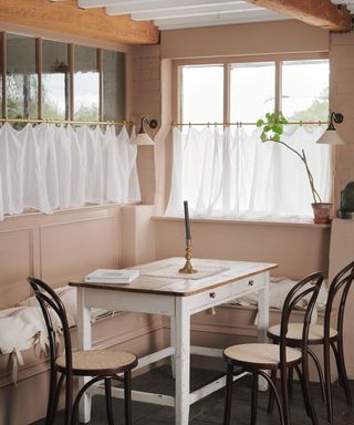 devol kitchens small corner coffee nook seating area with pink woodwork