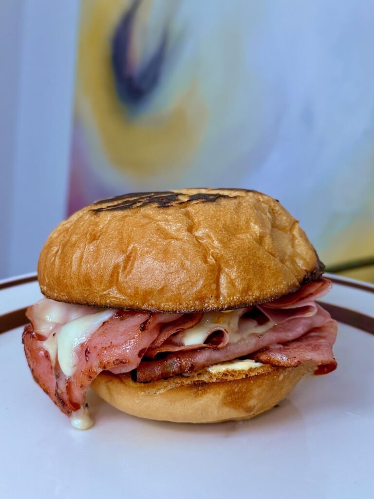 Pan fried mortadella with provolone, Kewpie, and Beaver dijon on a kaiser roll. Bourdain style