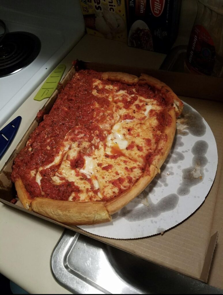 Delivery driver showed up with the pizza in a plastic grocery bag on its side Delivery driver showed up with the pizza in a plastic grocery bag on its side
