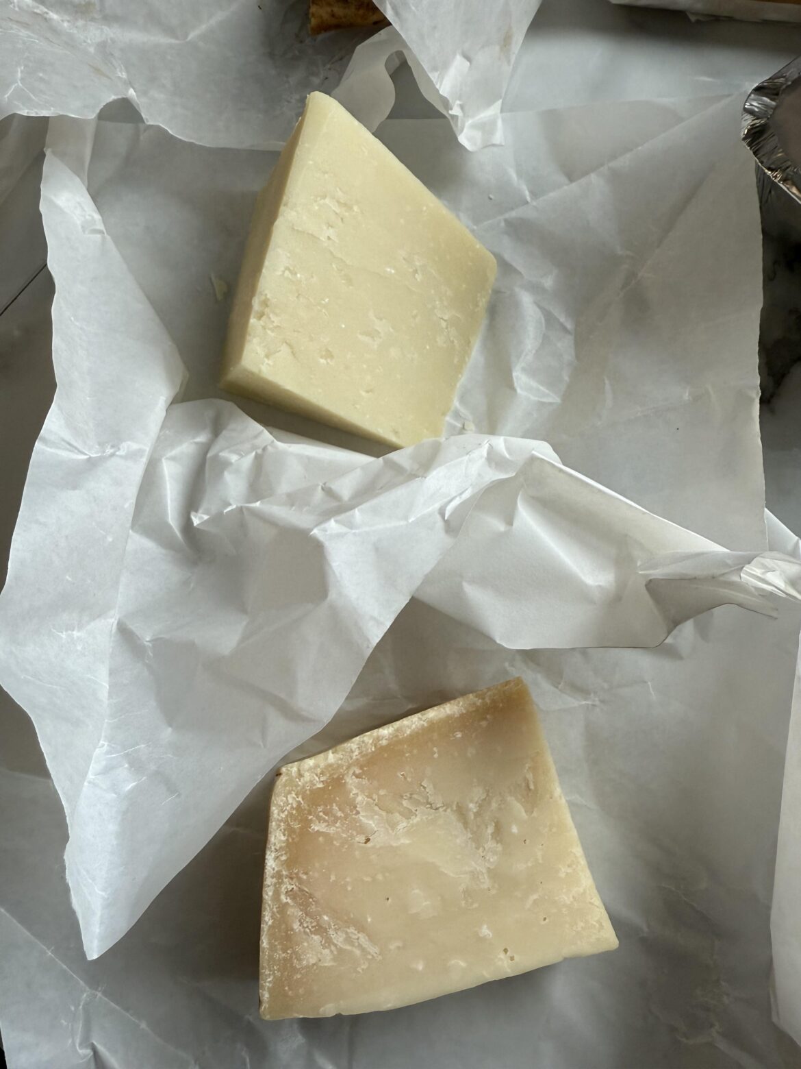 Cheese noob looking for help. I bought Pecorino Romano and Parmesan at the market but now cannot tell which is which.